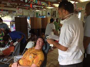 DAP Program Manager Peter Lothian receiving a free dental check up.